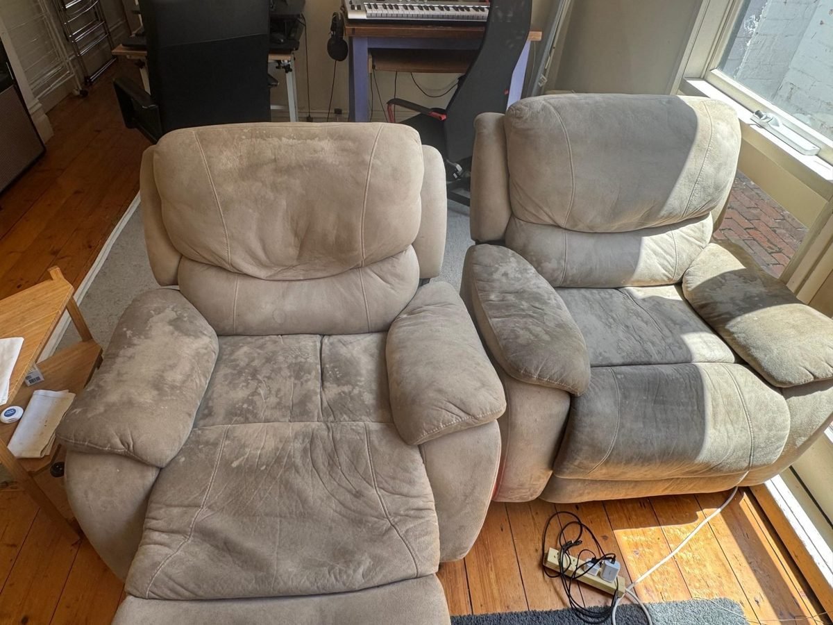 Two suede recliners, one cleaned and one still soiled, showing the difference
